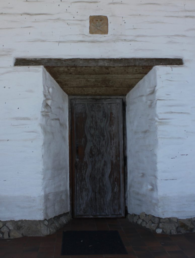 Door from graveyard to church