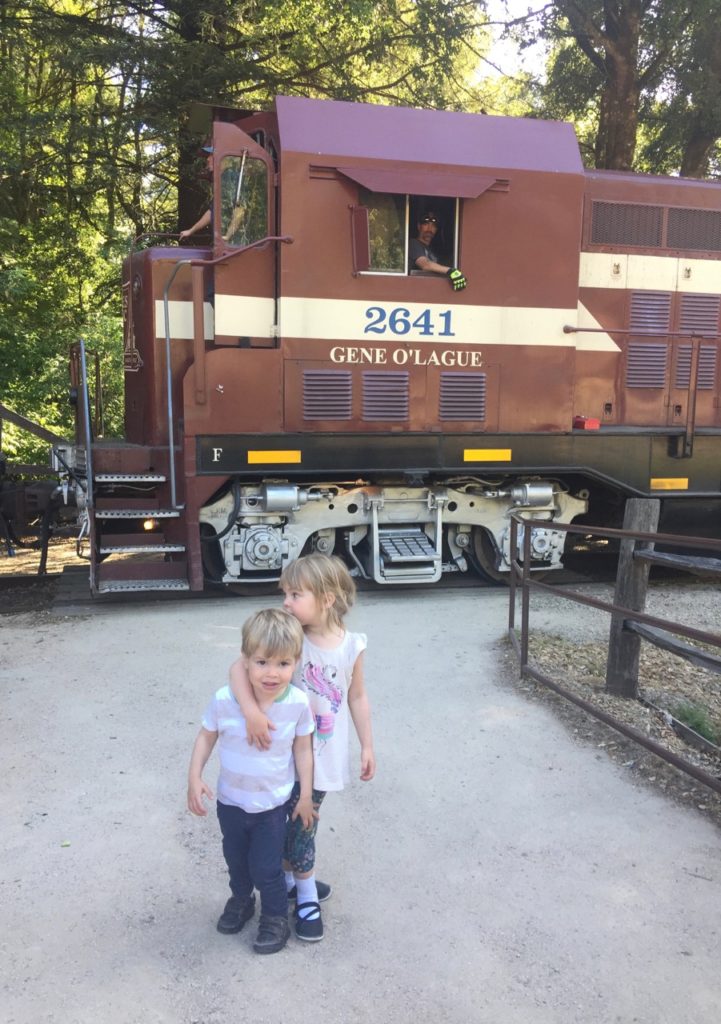 HJ and K pose with the train